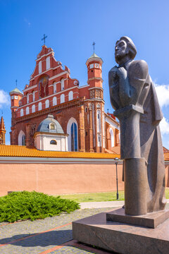A Statue of the Polish Poet Adam Mickiewicz in front of St. Anne's Church and the Church of St. Francis and St. Bernard, Vilnius, Lithuania