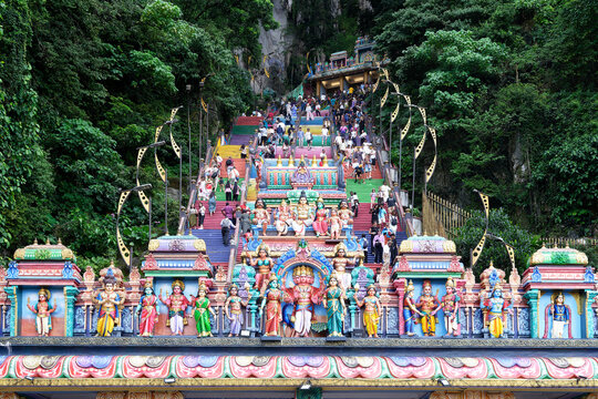 Colorful staircase leading to the caves with many pilgrims, Batu Caves complex, Kuala Lumpur, Malaysia, Asia