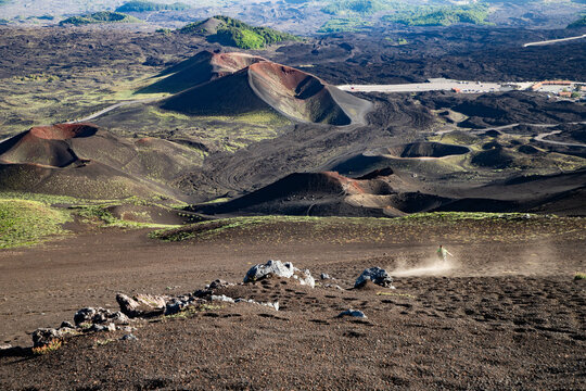 Exploring the unique landscape of Etna volcano with its textured surfaces and striking formations in Sicily, Italy