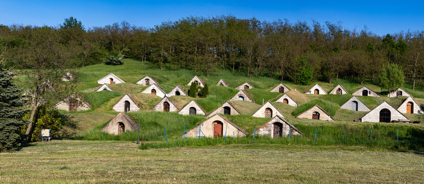 Wine cellars scattered across the hillside in Hercegkut, a notable area of wine production in Hungary