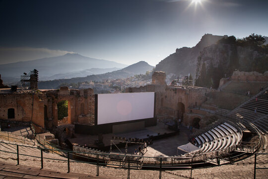 Empty white banner set up in ancient theatre in Taormina, Sicily for upcoming event or performance