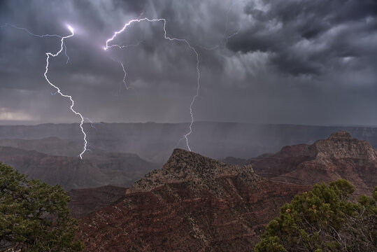 Lightning striking Freya's Castle viewed from Cape Royal on Grand Canyon North Rim, Arizona, USA
