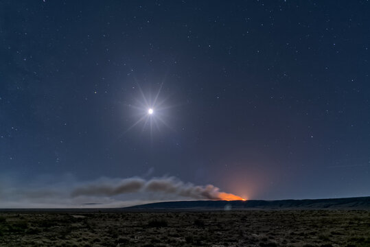 Dragon Bravo Wildfire on Grand Canyon North Rim at night, Arizona, United States