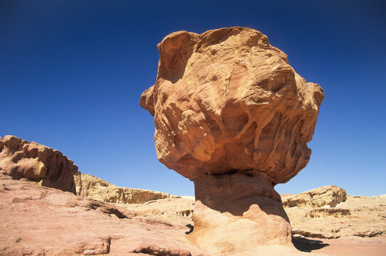 The Mushroom is a unique monolithic, mushroom-shaped, red sandstone rock formation, Timna Valley Park, Negev, Israel