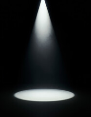 Dark empty room with single white spotlight