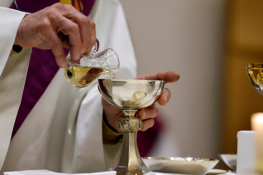 Catholic church. Eucharist celebration during sunday mass. Saint Pierre et Paul church. Saint Julien en Genevois. France.