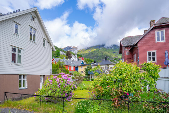 View of Sunnylven church and colourful houses in Hellesylt, Sunnylvsfjorden, Stranda Municipality, Norway, Scandinavia, Europe