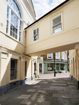 Visitors walk through a passageway near the Margate Museum in Margate Kent while looking for exhibits and local history information