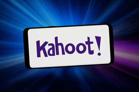 Stuttgart, Germany - 02-13-2026: In this photo illustration, the logo of online learning platform company Kahoot is displayed on a smartphone in front of abstract background on computer screen.