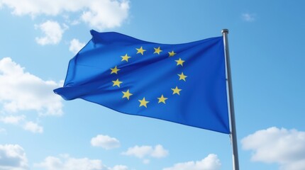 Flag of the European Union waving in the wind on flagpole against the sky with clouds on sunny day, banner, close-up 
