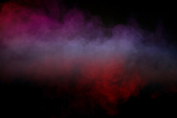 Obraz premium Orange and red steam on a black background.