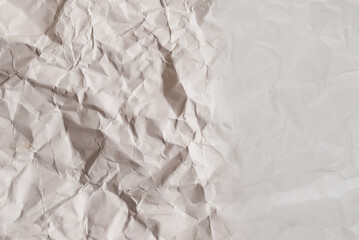 Obraz premium Crumpled white paper background.