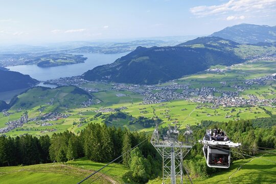 Convertible cable car, the world's first cable car with an open upper deck, leading up to the Stanserhorn, Stans, Canton Nidwalden, Switzerland