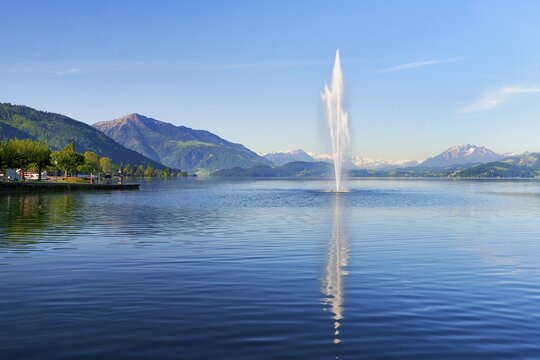 Fountain in Lake Zug, Rigi and Pilatus in the background, Zug, Canton Zug, Switzerland