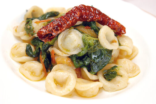 Orecchiette con le cime di rapa e peperone crusco is a typical food from Puglia and Basilicata region in Italy