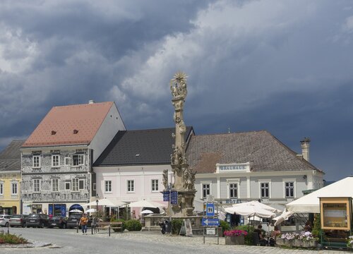 Plague column and sgraffito house on the town hall square, Weitra, Lower Austria, Austria