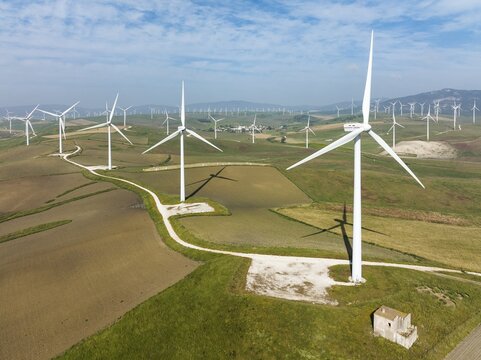 Windmills on a wind farm near Zahara de los Atunes, aerial view, drone shot, C&aacute;diz province, Andalusia, Spain