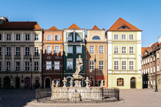  Proserpina Fountain and Colorful Historic Houses in Old Market Square, Poznan.