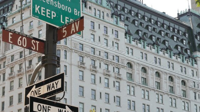 New York City Manhattan Midtown, United States. Old historic hotel building 1907 on Grand Army Plaza, 5 fifth avenue sign near Central Park. Classic iconic american architecture. Pulitzer Plaza in NYC