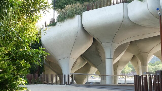 New York City Little Island pier park in Midtown of Manhattan, United States. Urban garden oasis on pillars in Chelsea, USA. Biophilic futuristic contemporary design, eco flora, plants and greenery.