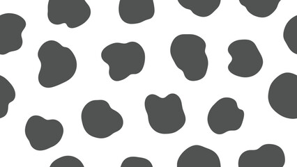 Fototapeta premium A minimalist illustration of dark gray spots on a white background