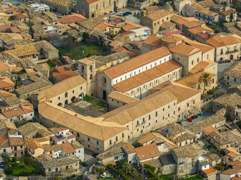 Aerial view of Duomo of Gerace, a town and comune in the Metropolitan City of Reggio Calabria, Calabria, southern Italy. The co-cathedral basilica of Santa Maria Assunta in Gerace