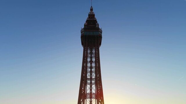 Drone Shot of Blackpool Tower against a Clear Blue Sky at Sunrise