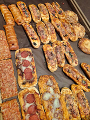 Small pizzas. Bakery products on a supermarket shelf
