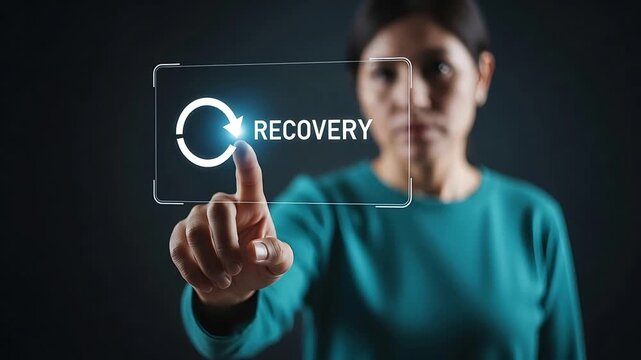 Woman Interacting with Recovery Interface Button on Virtual Screen