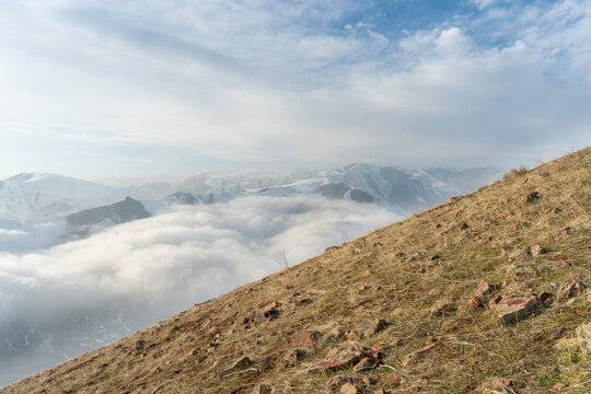 Mountain Slope Above Cloud Layer in Chatkal Range Uzbekistan in Winter