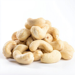Isolated raw cashew nuts pile on white background.