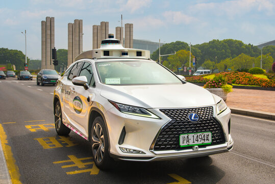 Shanghai, China 1 Nov 2025. Level 4 Robotaxi with lidars, multi camera array, radar sensors and end to end AI driving stack. Transports real passengers as China leads next gen mobility technologies.
