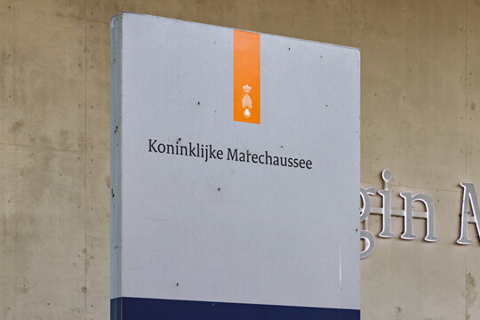 Signboard with the logo and name of the Koninklijke Marechaussee at the entrance of the Koningin M&aacute;xima military barracks at Schiphol Airport. Schiphol, Netherlands. 8 February 2026.