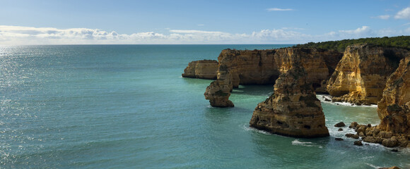 Landscape with beautiful Praia da Marinha, one of the most famous beaches of Portugal, located on the Atlantic coast in Lagoa, Algarve.