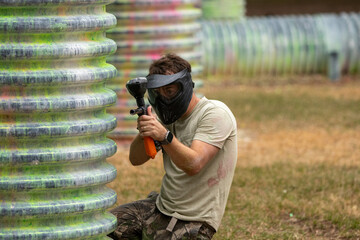 Guy playing paintball © Steve