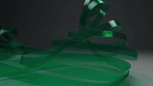 Green flip flops with straps on a reflective surface.
