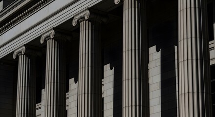 Obraz premium Image of a row of classical columns with intricate details, showcasing architectural elements and shadows