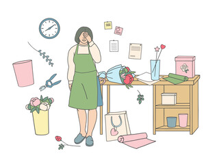 Tired female florist covering face with hand near work table and fallen rose