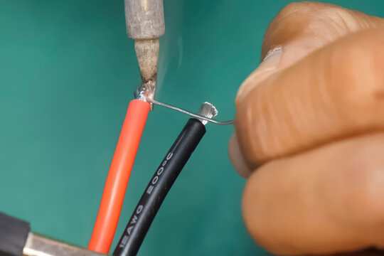 Soldering contacts with a new flux at the bare ends of the wires