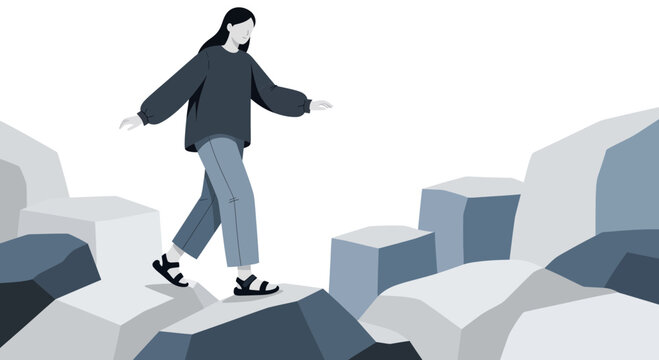 A Woman Navigates A Rocky Terrain With Focus And Determination