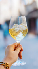 Obraz premium Evening Gathering In Lively City. People Enjoying Outdoor Beverages Amidst Busy City Streets At Sunset. Social Gathering Outdoors Where Individuals Share Drinks Beneath Vibrant City Sky At Dusk