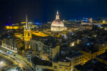 Fototapeta premium Basilica Sanctuary of Our Lady of Mount Carmel at night - Valletta, Malta