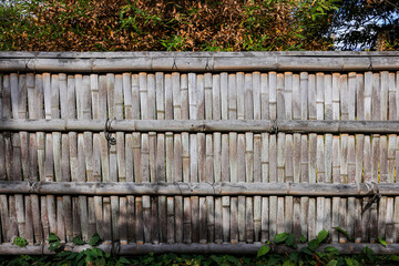 Fototapeta premium Close up detail of Japanese tradition style bamboo fence panel.