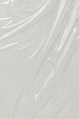Obraz premium Plastic transparent cellophane bag on white background. White plastic film wrap texture background. White Plastic Bag Texture