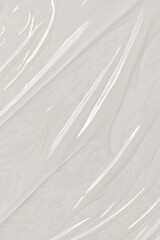Fototapeta premium Plastic transparent cellophane bag on white background. White plastic film wrap texture background. White Plastic Bag Texture