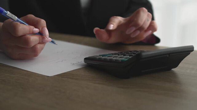 Using a counting machine in a bank.
Counting money in a bank.
Economics and Business