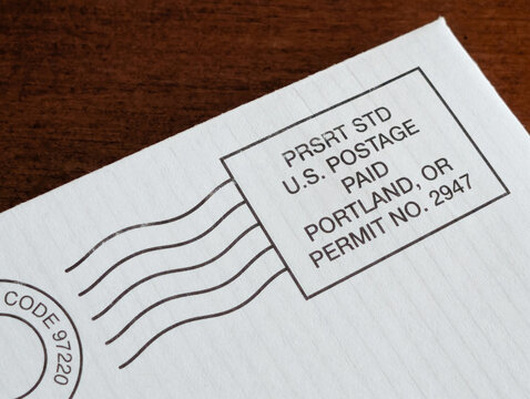 Close up of US presort mailing import or indicia on corner of an envelope