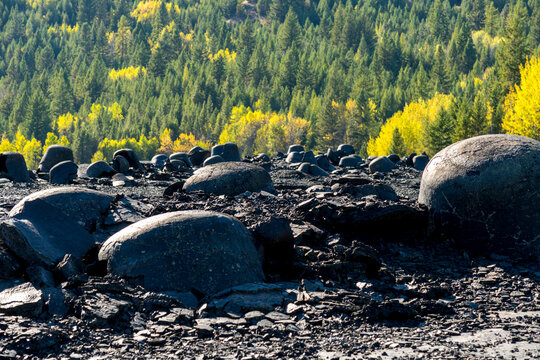 Canada, Canada, BC, Anaconda (near Greenwood), BC.   Glasslike remains of old slag pile, outside abandoned British Columbia Copper Company smelter.  It processed ore from the nearby Motherlode Mine 