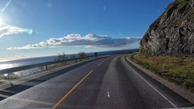 Driving scenic coastal road in Lofoten Islands, Norway