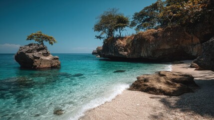 Fototapeta premium Serene Tropical Beach with Clear Blue Water and Rocky Cliffs Surrounded by Lush Greenery Under Bright Sunny Sky in a Peaceful Coastal Environment